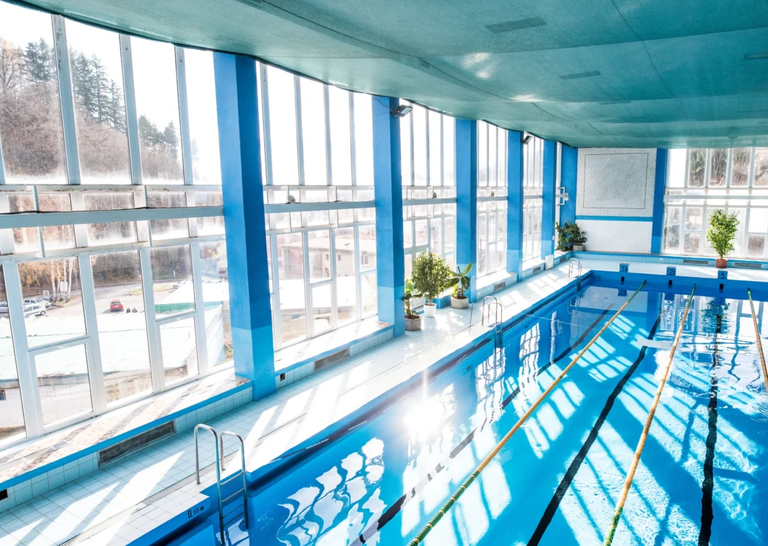 Interior view of empty public swimming pool in England.