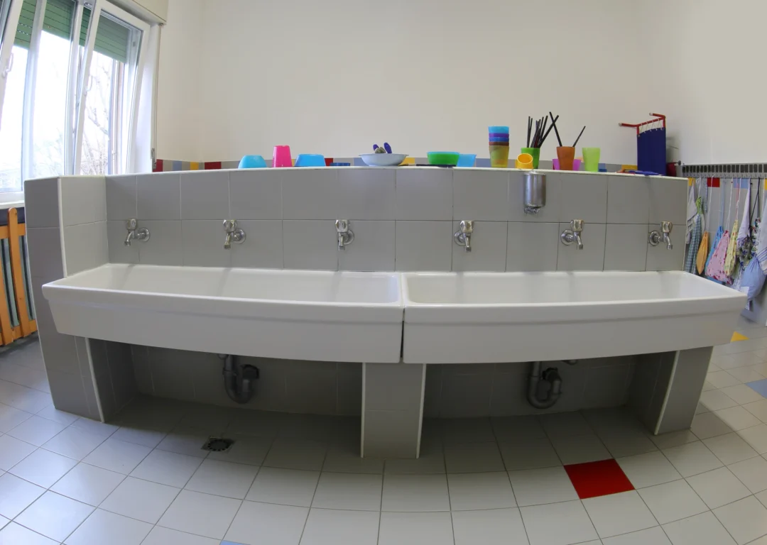 Children's sinks in a school or nursery, important for school water treatment.