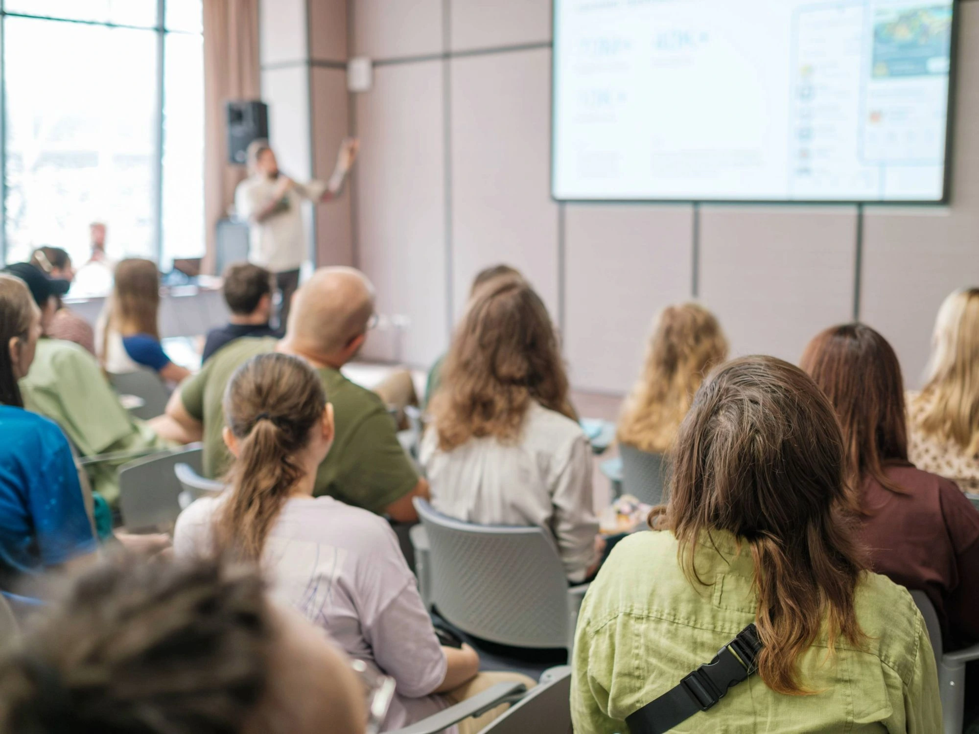 A group of people in a legionella training session.
